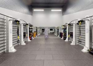 inside view gym with equipment on walls